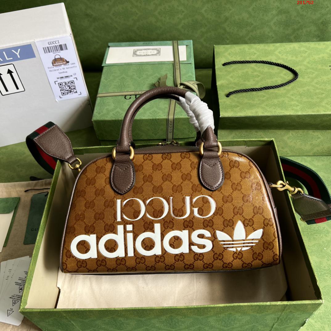 adidas x Gucci联名系列迷你旅行包 702397 棕色 pvc水晶料。